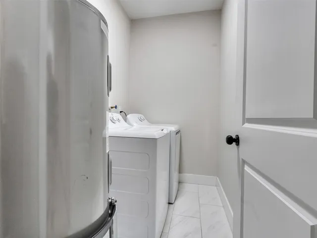 a bathroom with a sink and vanity