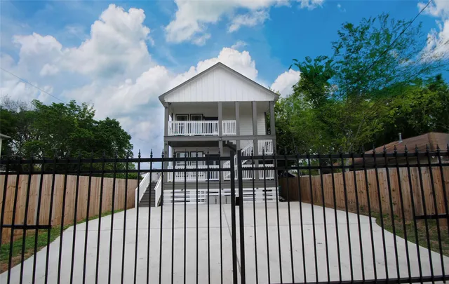 a view of a houses with a balcony