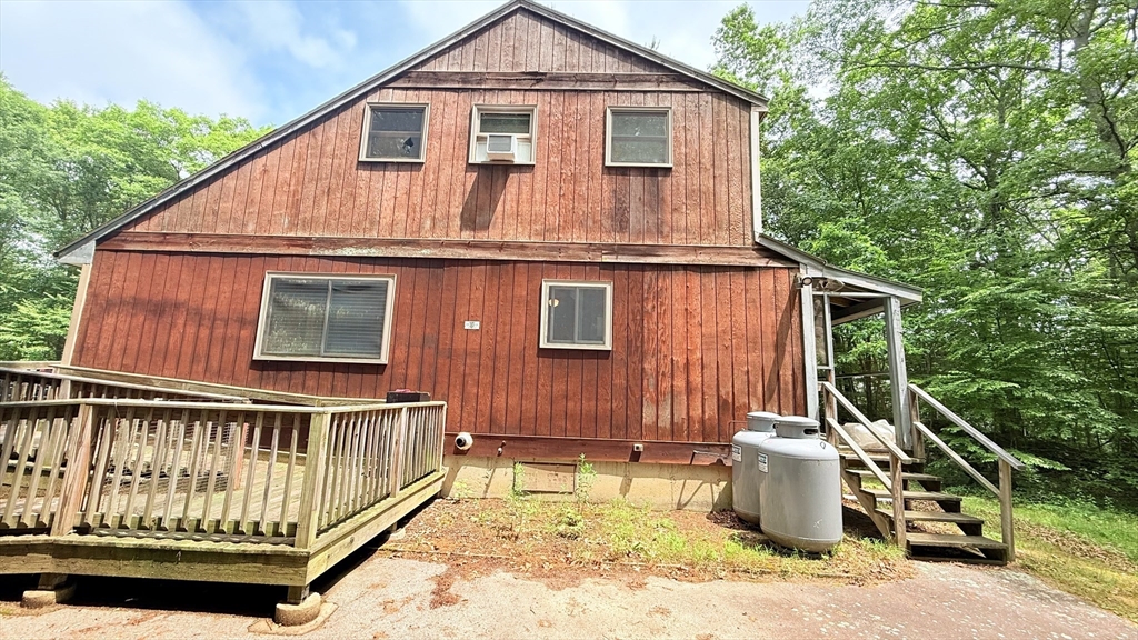 1755 Maple Street Dighton, MA 02764 - Photo 3 of 23 a front view of a house with a yard