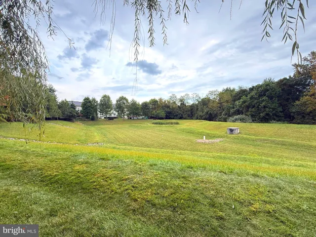 a view of a swimming pool with an ocean view