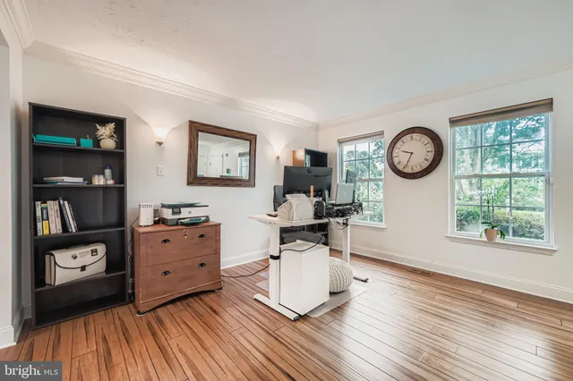 a living room with furniture and window