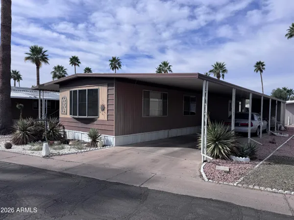 a view of a house with sitting area