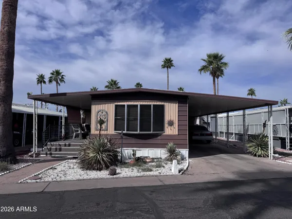 a front view of a house with a porch