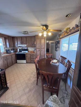 a view of a dining room with furniture