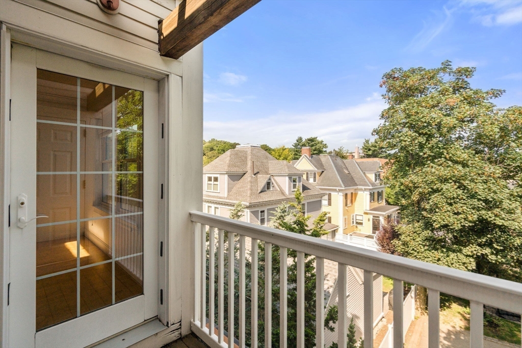 121 Centre Street, Unit PH3 Brookline, MA 02446 - Photo 25 of 32 a view of a balcony