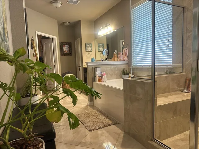 a lobby with a sink and mirror