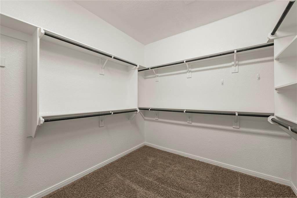 10420 Langham Drive Waco, TX 76708 - Photo 17 of 36 a view of an empty walk in closet