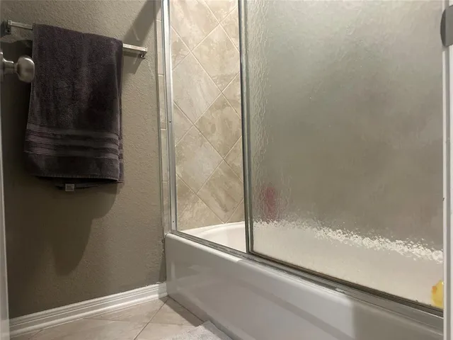 a bathroom with a bathtub