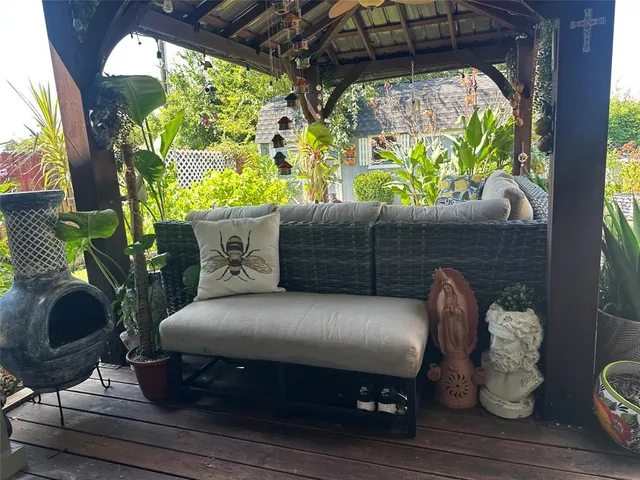 a bed sitting in a bed next to a window