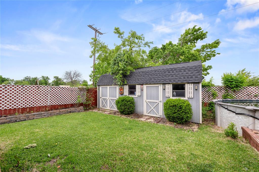 10420 Langham Drive Waco, TX 76708 - Photo 34 of 36 a view of a house with a yard and potted plants
