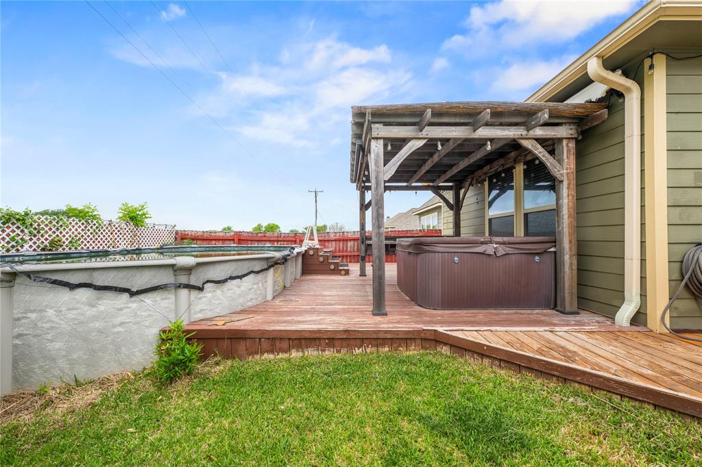10420 Langham Drive Waco, TX 76708 - Photo 35 of 36 a view of outdoor space yard deck and patio
