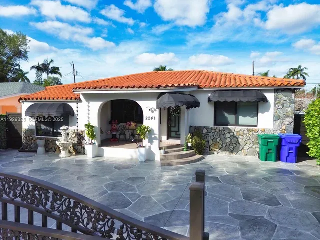 a view of a house with patio