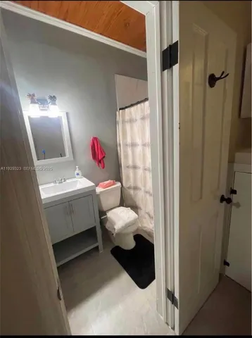 a view of a backyard with a patio