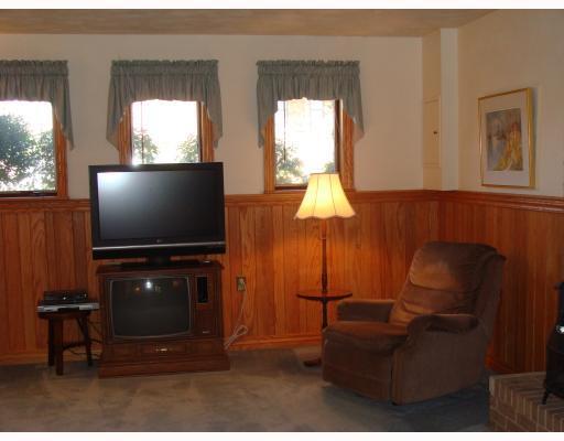 111 Redcut Lodge Road Latrobe, PA 15650 - Photo 15 of 18 Den/Family/Great Room. Family Room - authenic oak tongue and groove paneling and neutral wall to wall carpet.