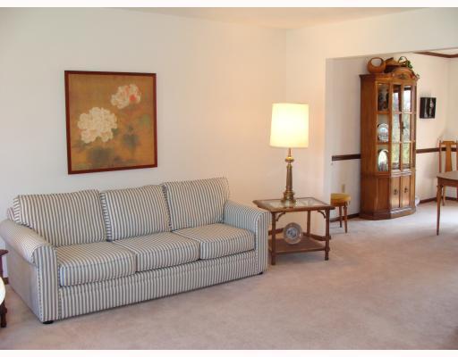 111 Redcut Lodge Road Latrobe, PA 15650 - Photo 8 of 18 Living Room. Living room with partial view of the formal dining room.