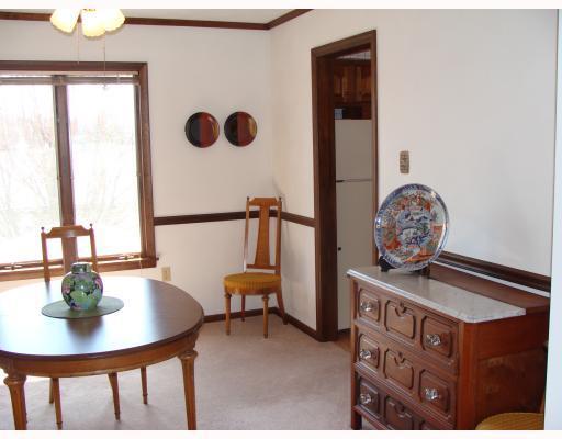 111 Redcut Lodge Road Latrobe, PA 15650 - Photo 10 of 18 Dining Room. Dining Room - neutral wlll to wall carpet and wood stained trim.