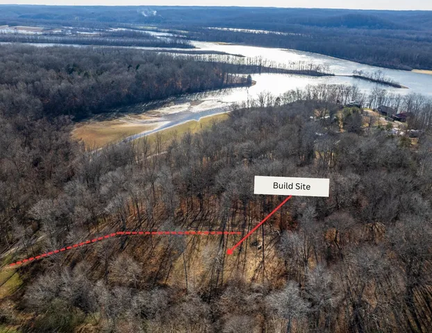 a view of residential house with parking space