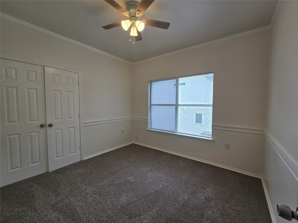 5404 Garden View Cove Austin, TX 78724 - Photo 18 of 28 a view of an empty room with a window