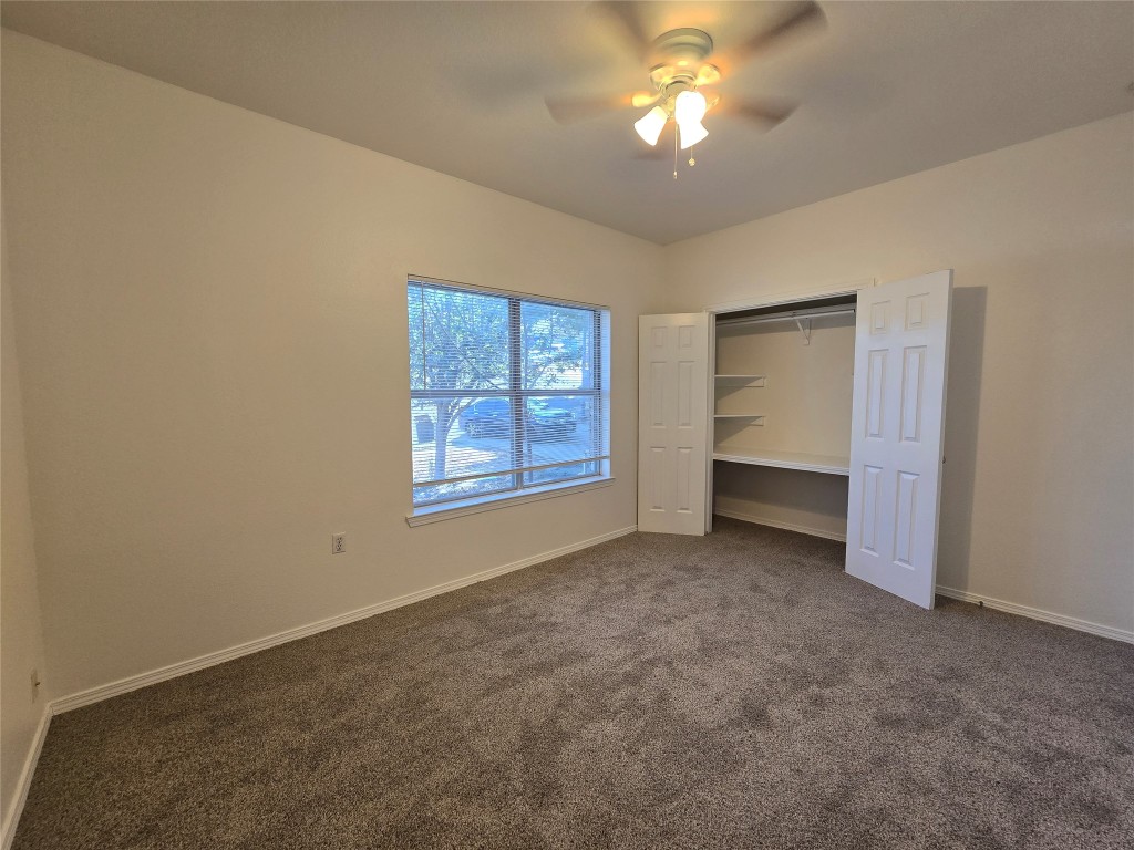 5404 Garden View Cove Austin, TX 78724 - Photo 22 of 28 a view of an empty room with a window