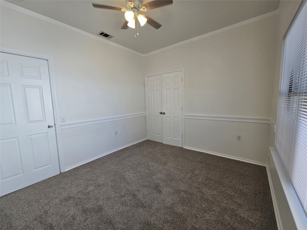 5404 Garden View Cove Austin, TX 78724 - Photo 24 of 28 an empty room with chandelier fan