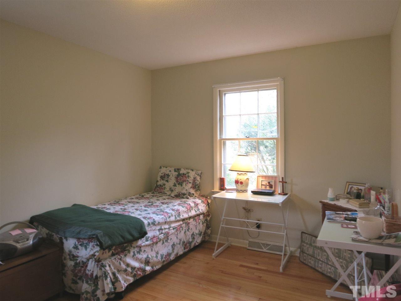 5305 Country Court Raleigh, NC 27609 - Photo 13 of 21 There are 2 add’l spacious Bedrooms w/lg closets & hardwood flooring. This is Bedroom 2.