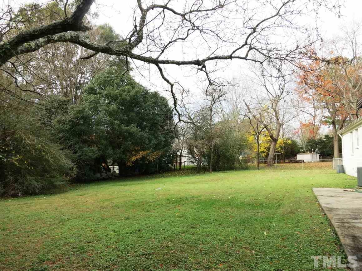 5305 Country Court Raleigh, NC 27609 - Photo 20 of 21 Another view of the spacious fenced backyard.