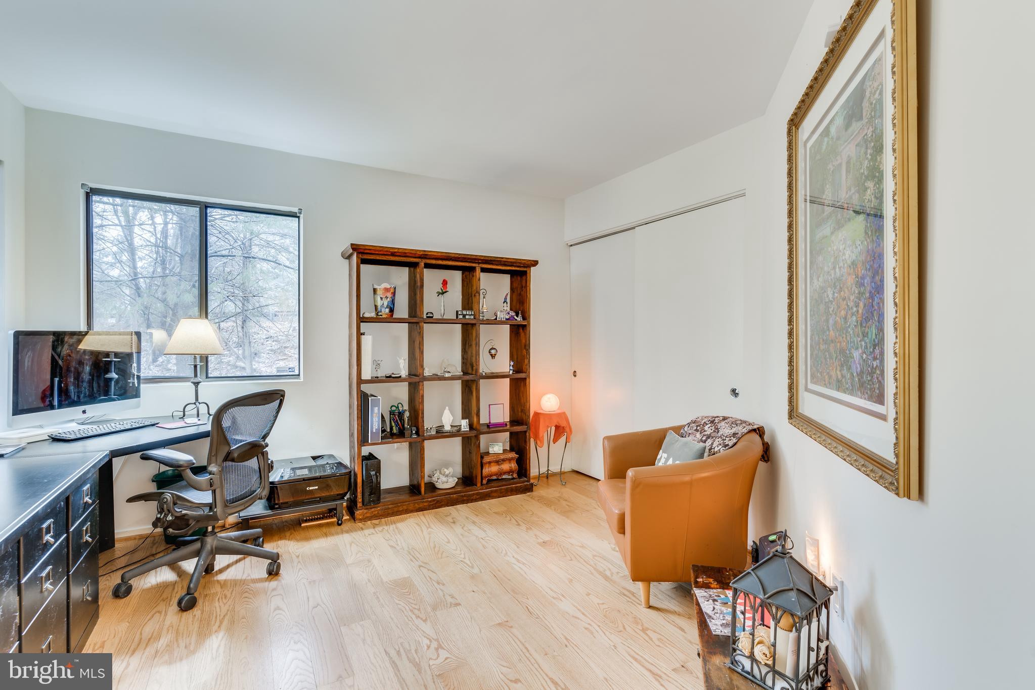 11900 Moss Point Lane Reston, VA 20194 - Photo 11 of 33 a view of a workspace with furniture and a window