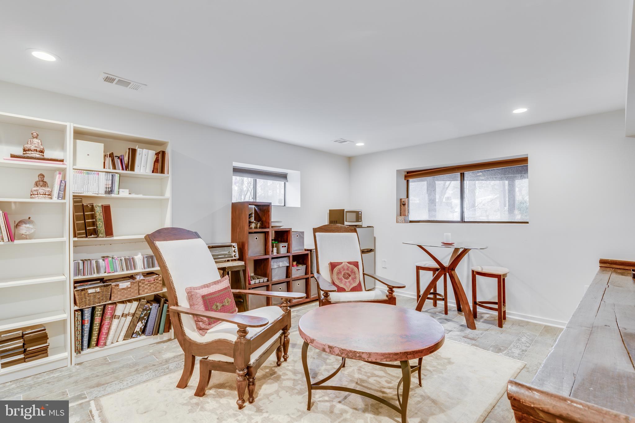 11900 Moss Point Lane Reston, VA 20194 - Photo 19 of 33 a dining room with furniture and a floor to ceiling window