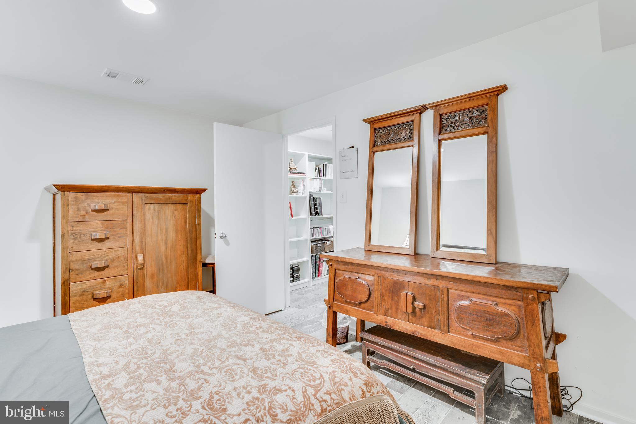 11900 Moss Point Lane Reston, VA 20194 - Photo 22 of 33 a bedroom with a bed and a dresser