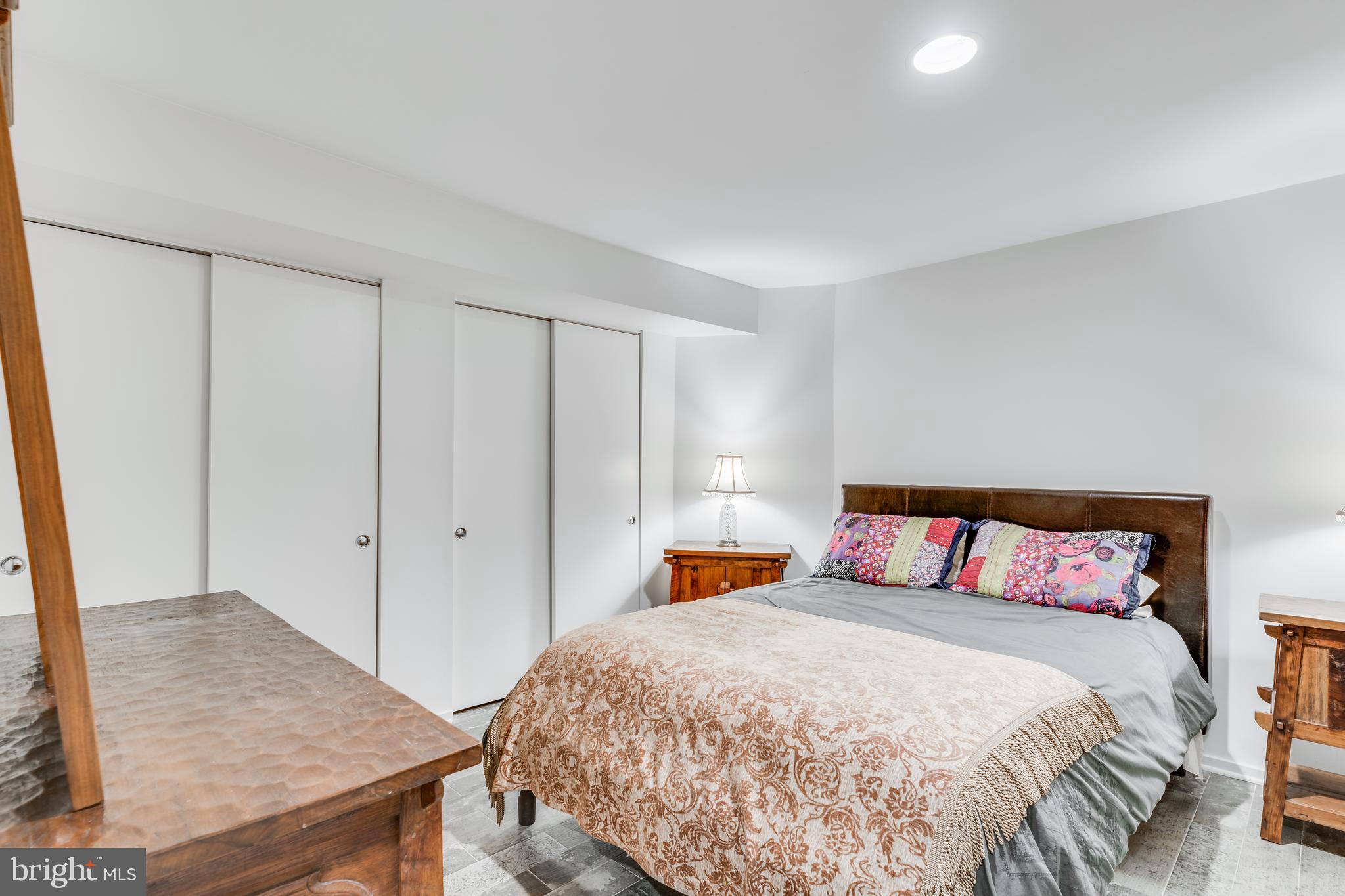 11900 Moss Point Lane Reston, VA 20194 - Photo 23 of 33 a bedroom with a bed and wooden floor