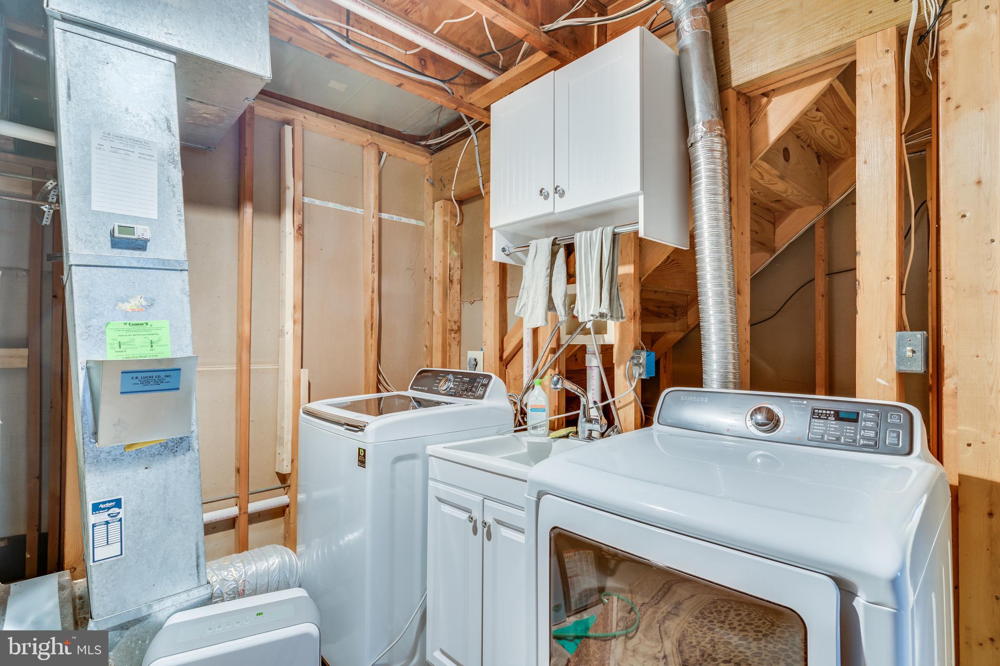 11900 Moss Point Lane Reston, VA 20194 - Photo 26 of 33 a utility room with dryer and washer