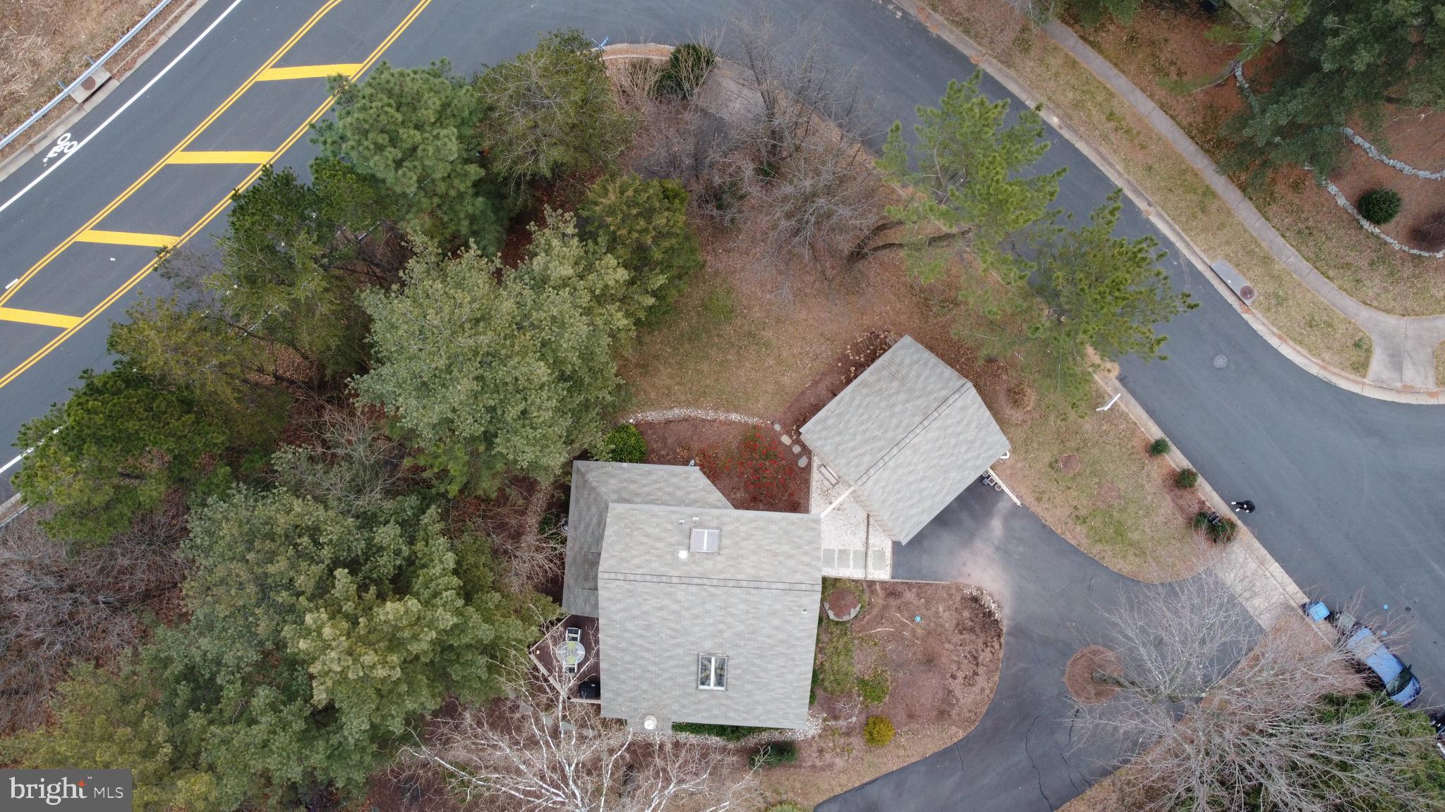 11900 Moss Point Lane Reston, VA 20194 - Photo 30 of 33 an aerial view of a house with a yard and plants