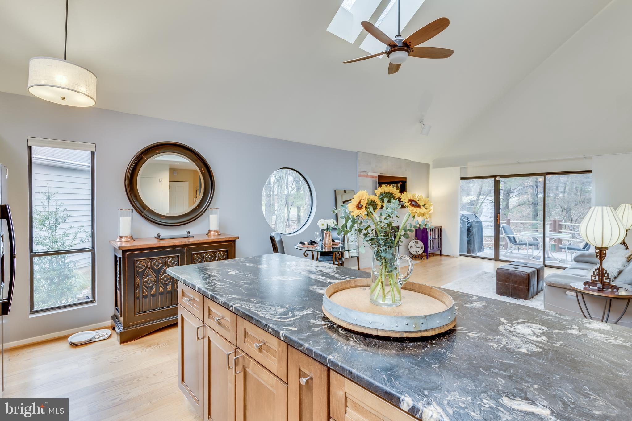 11900 Moss Point Lane Reston, VA 20194 - Photo 6 of 33 a room with dining table and a chandelier
