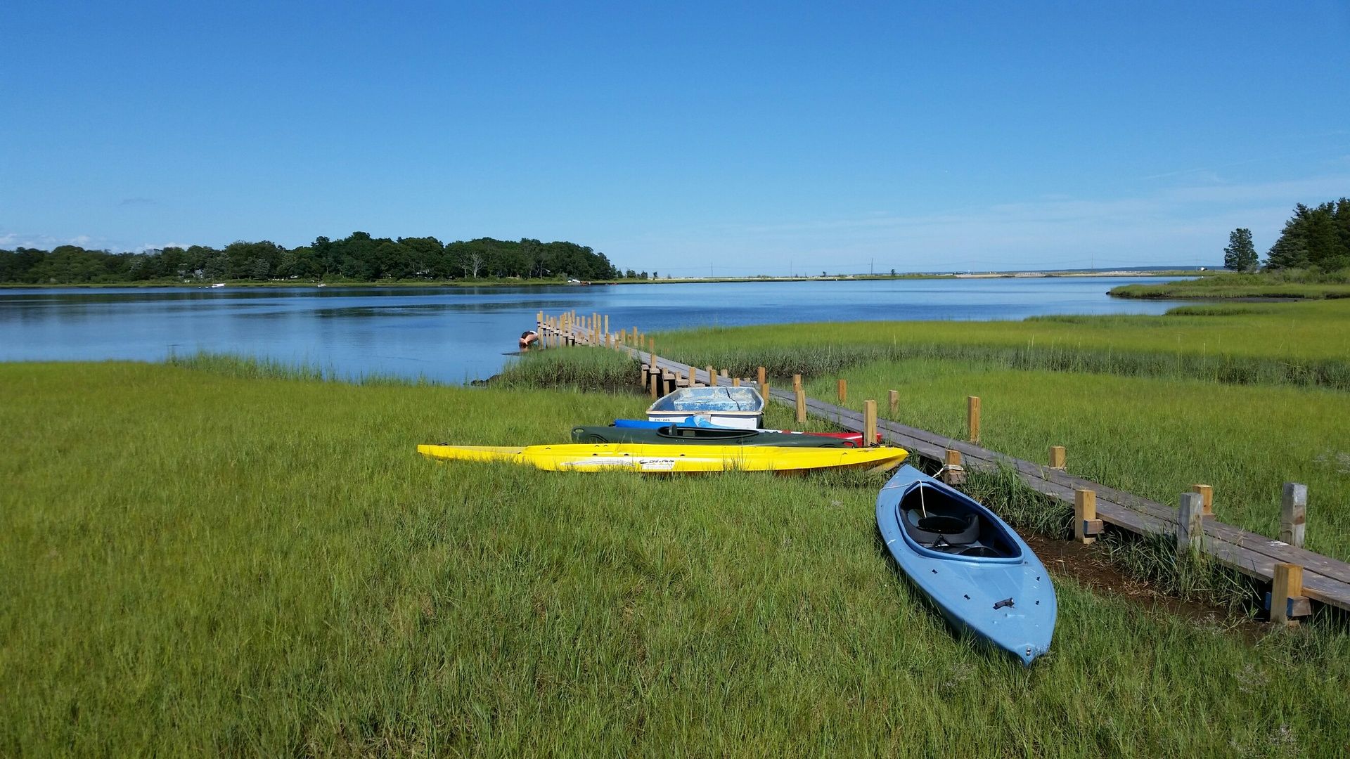 1008 Springs Fireplace Road East Hampton, NY 11937 - Photo 19 of 19 a view of a lake with a big yard