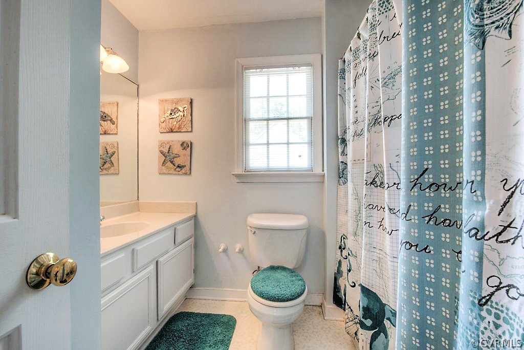 5405 Windy Ridge Drive Midlothian, VA 23112 - Photo 31 of 41 Spacious Hall Bath with White Cabinetry and New Li
