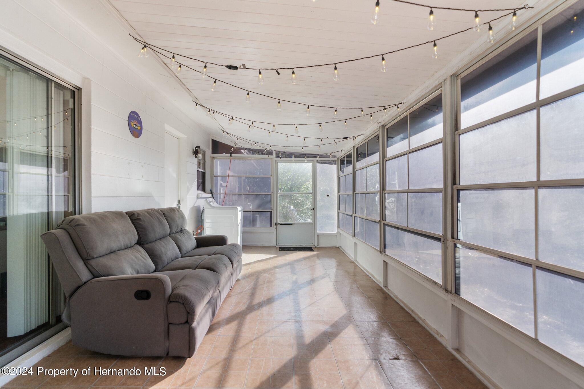 9124 Eldridge Road Spring Hill, FL 34608 - Photo 19 of 26 a living room with furniture