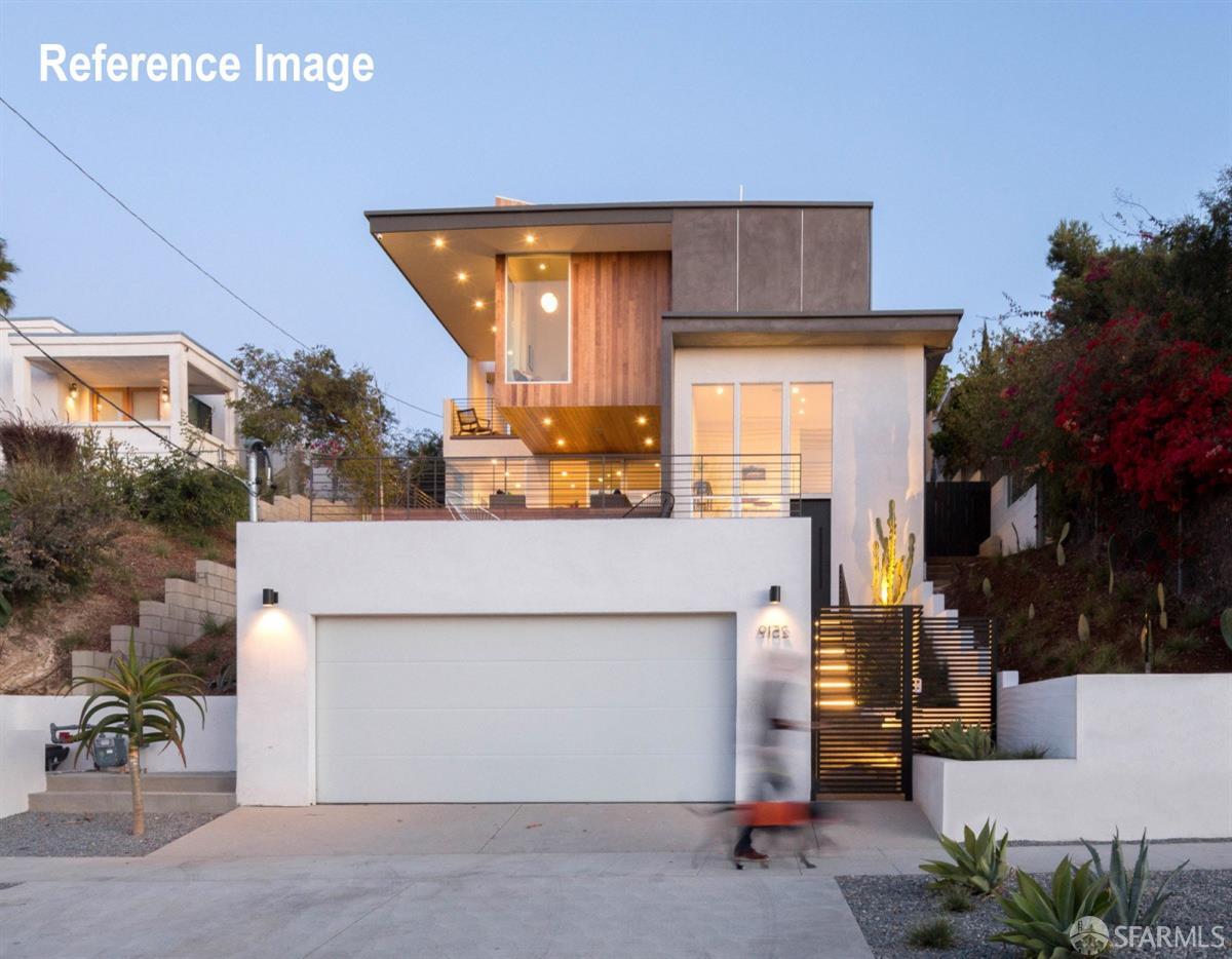 7003 Buckingham Boulevard Berkeley, CA 94705 - Photo 2 of 8 a view of a house with a patio and a yard