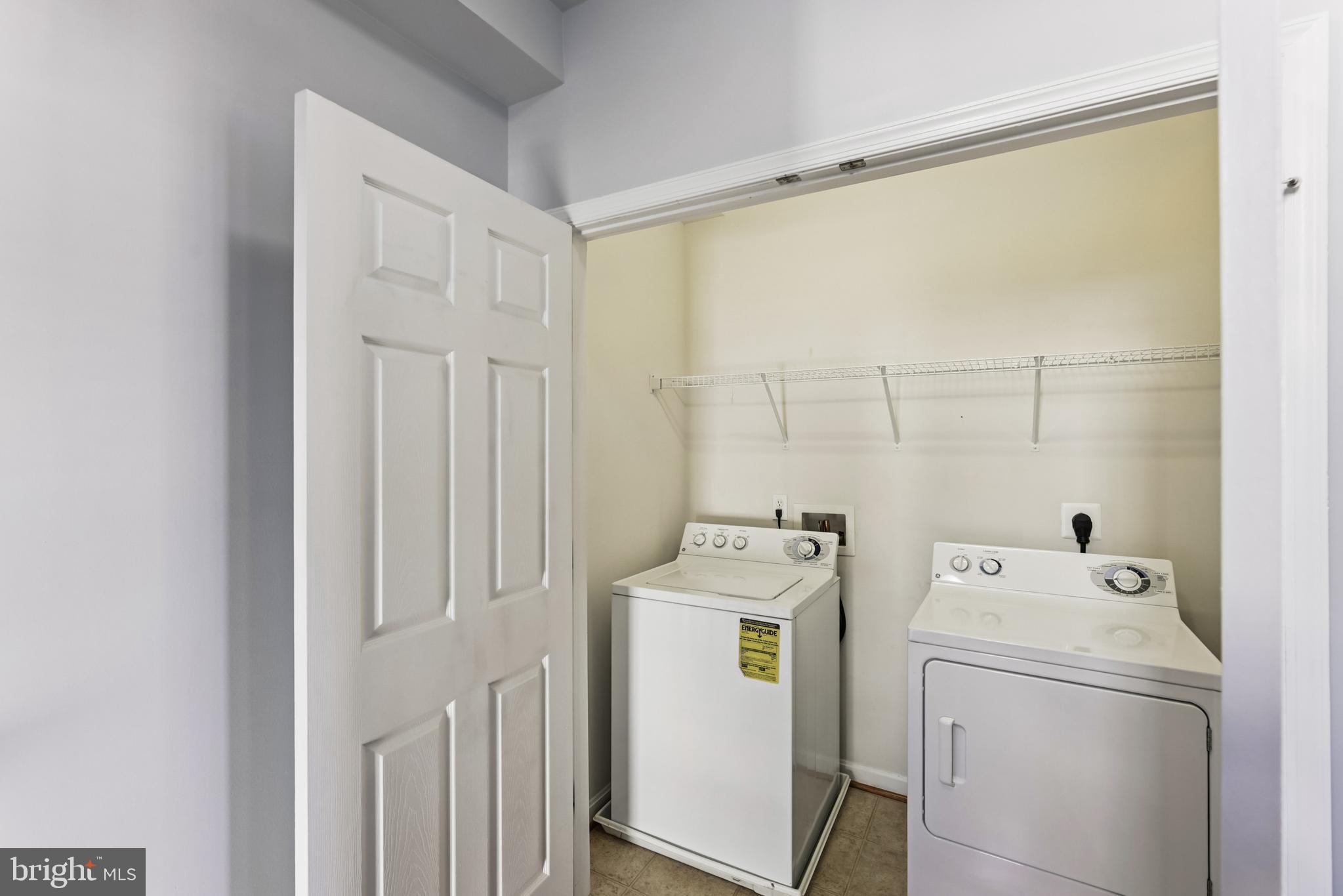 6821 Hampton Bay Lane Gainesville, VA 20155 - Photo 17 of 29 a utility room with dryer and washer