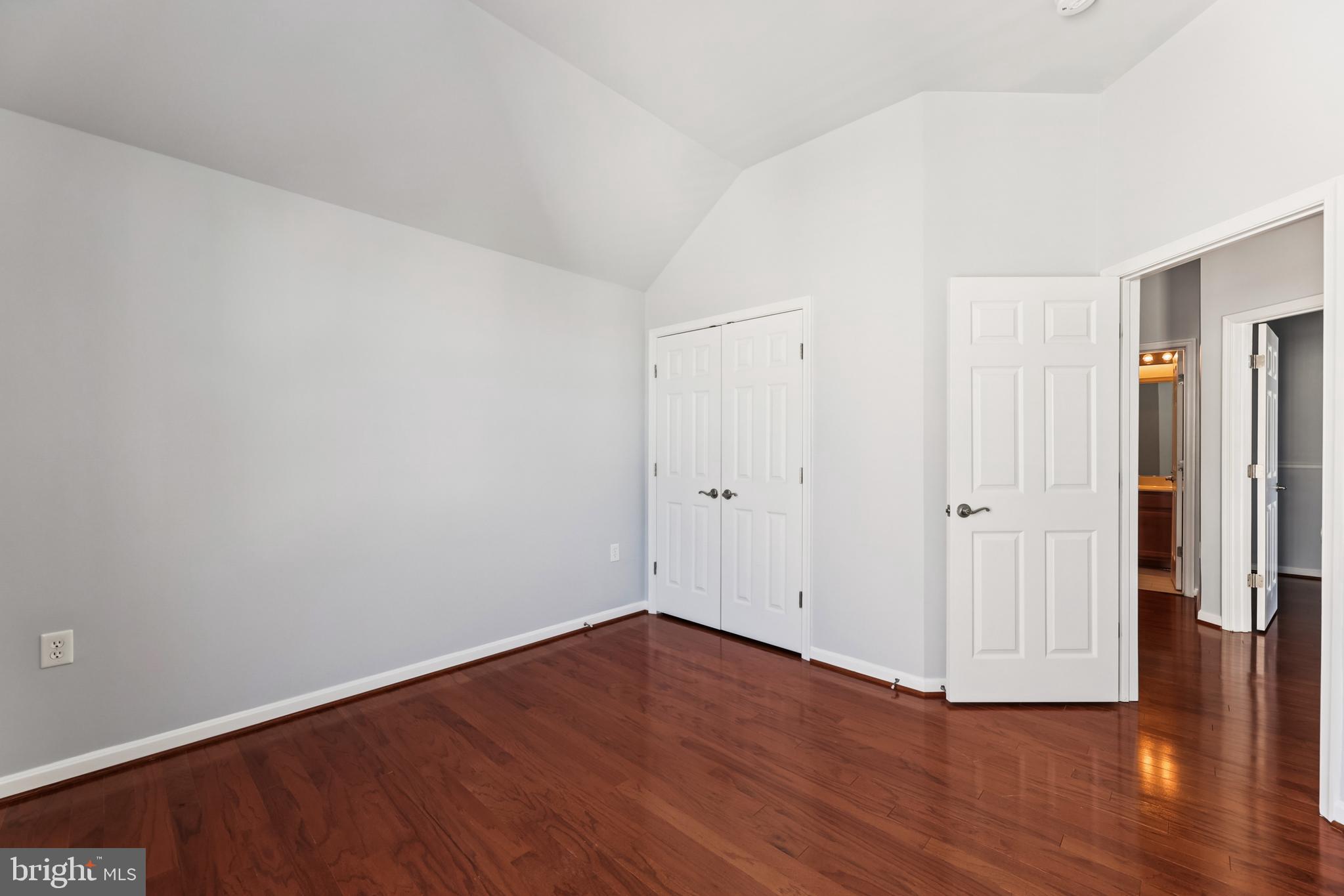 6821 Hampton Bay Lane Gainesville, VA 20155 - Photo 28 of 29 a view of an empty room with wooden floor
