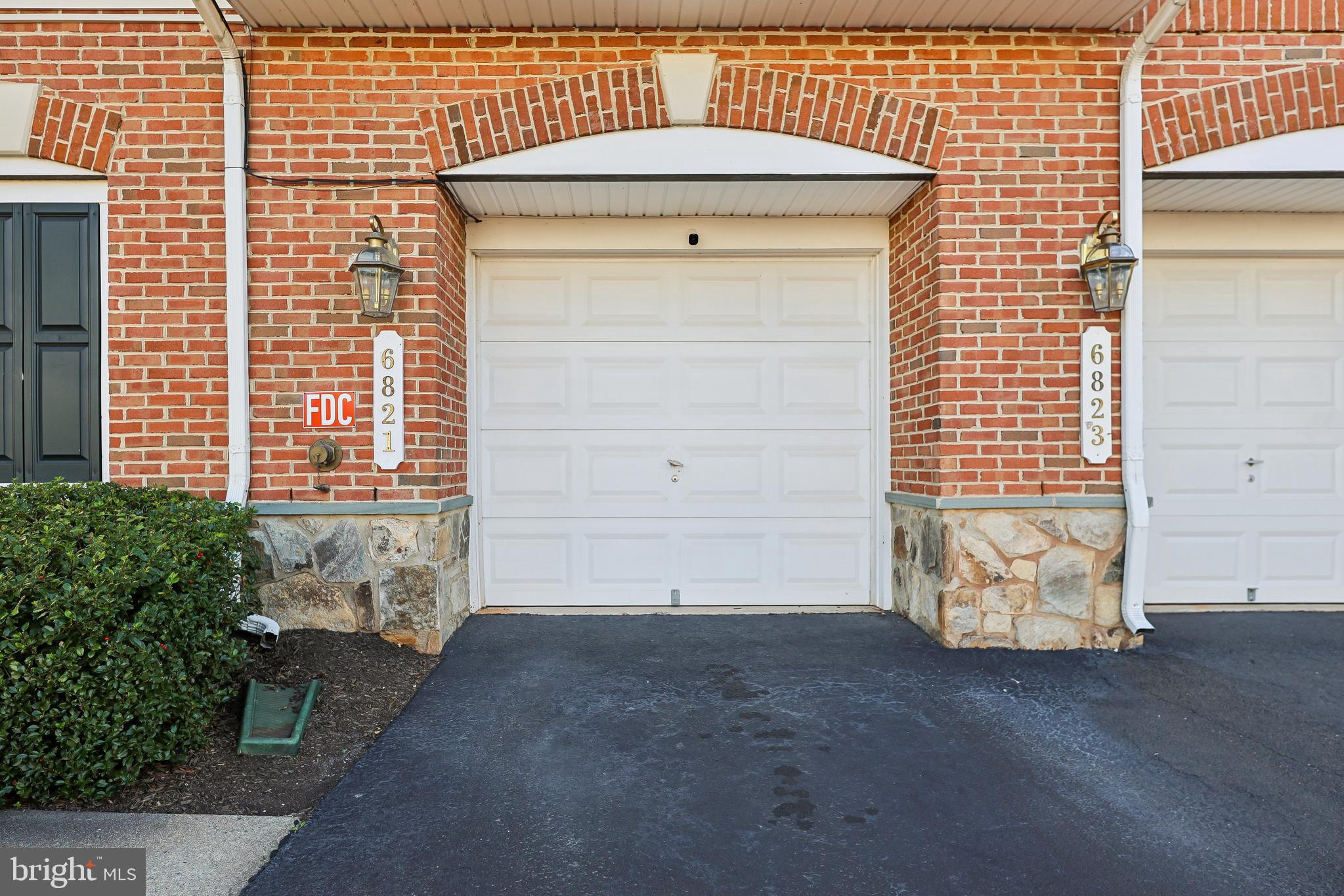 6821 Hampton Bay Lane Gainesville, VA 20155 - Photo 3 of 29 a view of an entrance of the house