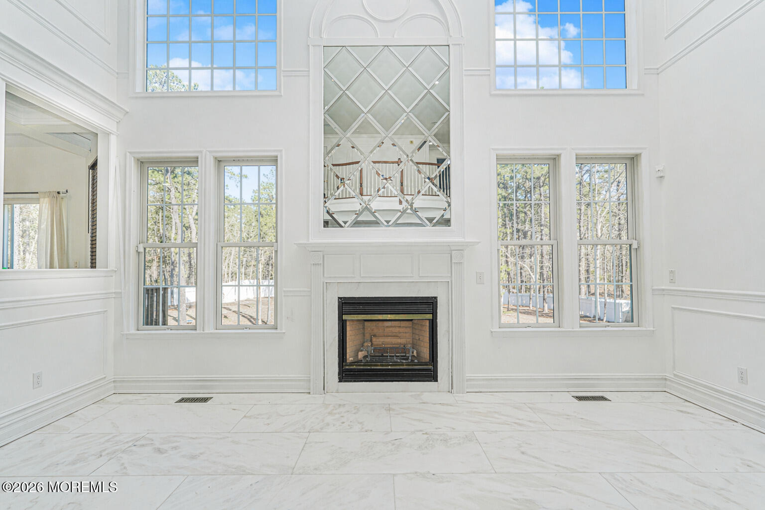 4 Wilson Boulevard Jackson, NJ 08527 - Photo 22 of 75 an empty room with windows fireplace and cabinet