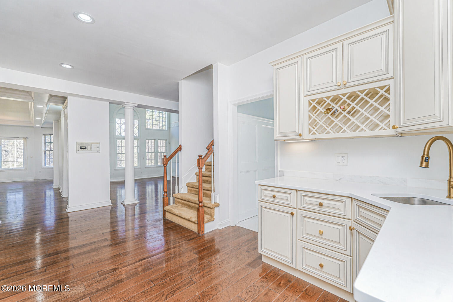 4 Wilson Boulevard Jackson, NJ 08527 - Photo 32 of 75 a kitchen with white cabinets and a wooden floor