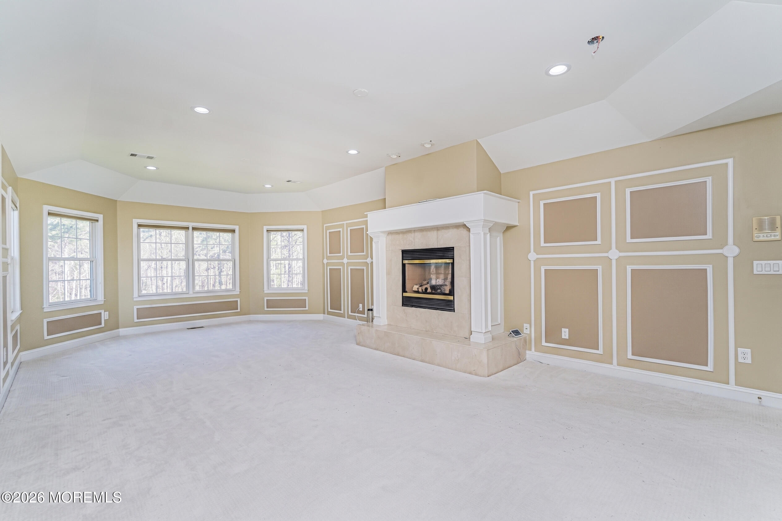 4 Wilson Boulevard Jackson, NJ 08527 - Photo 36 of 75 a view of an empty room with a fireplace and a window