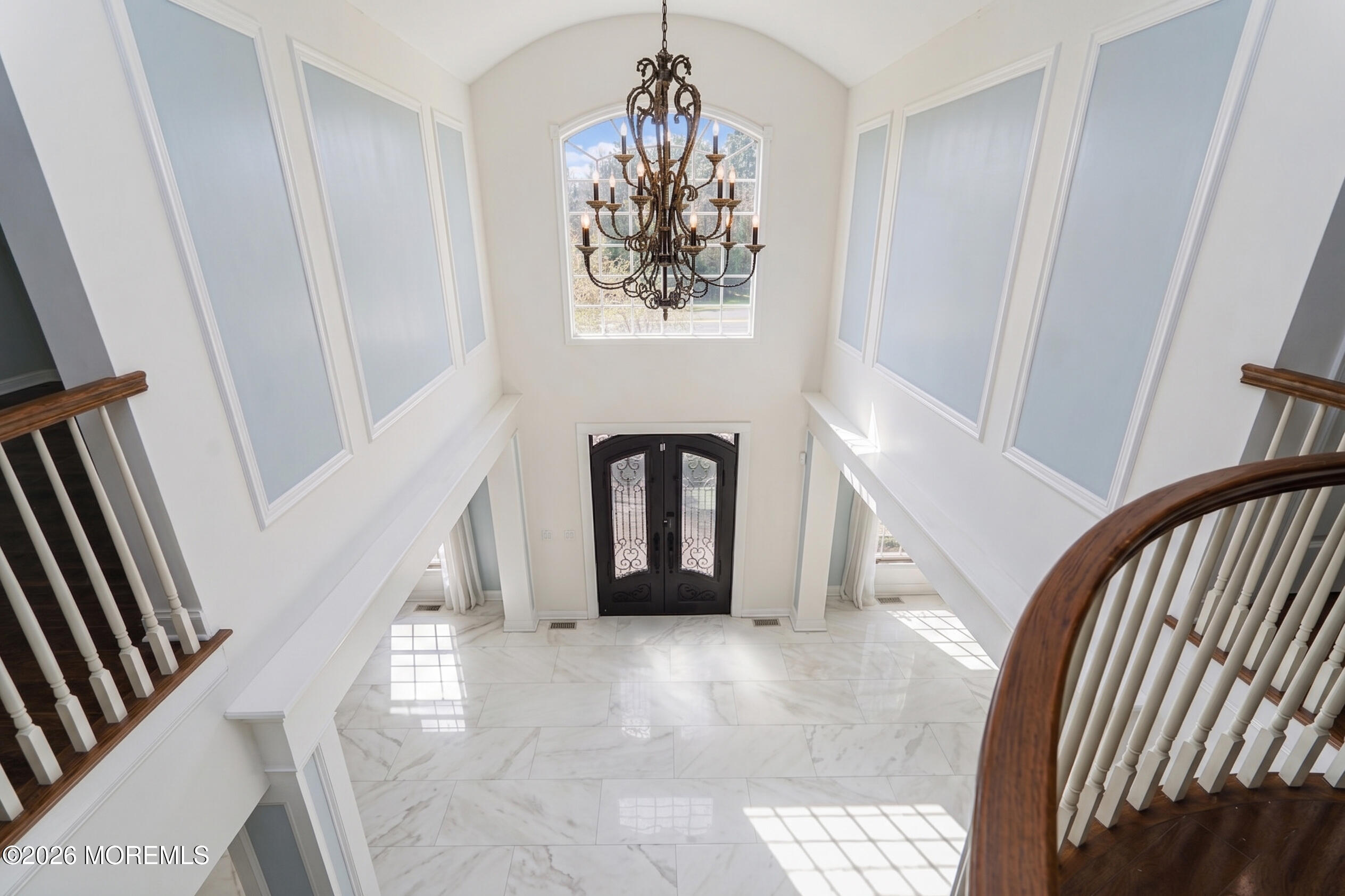 4 Wilson Boulevard Jackson, NJ 08527 - Photo 5 of 75 a view of a hallway to a window and stairs