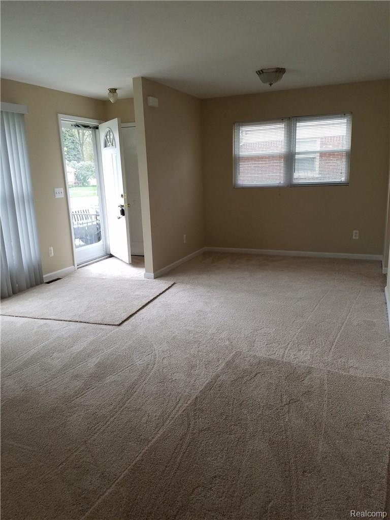 8995 Henry Ruff Road Livonia, MI 48150 - Photo 4 of 17 Henry Ruff living room.jpg