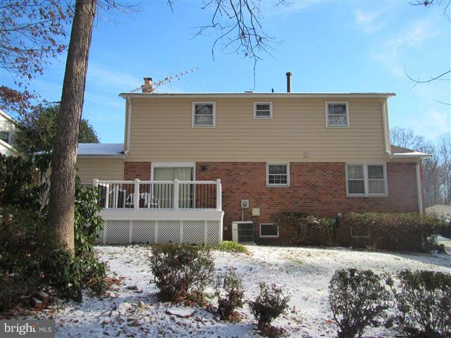 7014 Spaniel Road Springfield, VA 22153 - Photo 2 of 2 a front view of a house with plants