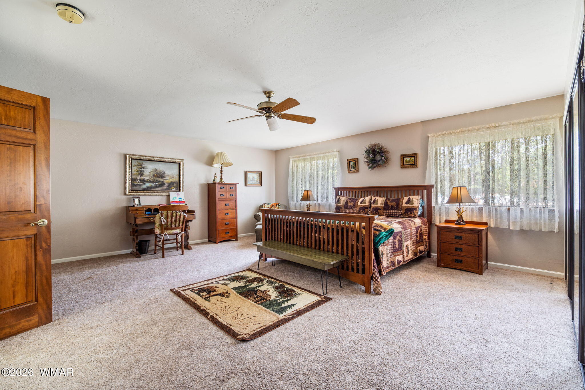 2922 Pine Rim Road Overgaard, AZ 85933 - Photo 21 of 58 a bedroom with furniture and a window