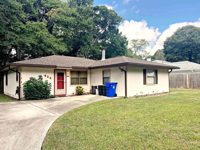 a view of a house with a swimming pool