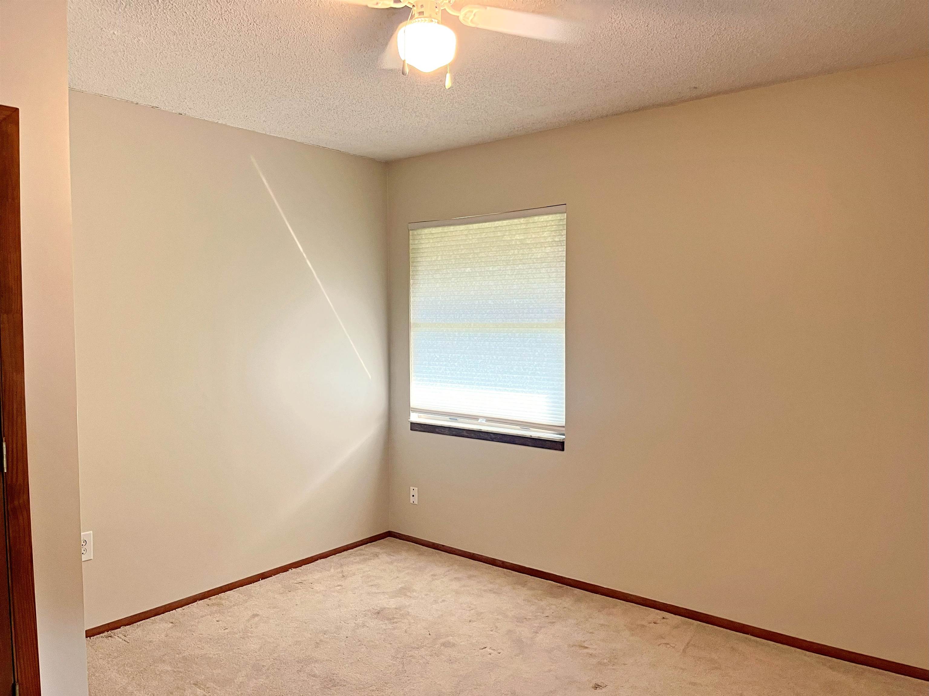 424 Orchis Road St. Augustine, FL 32086 - Photo 12 of 24 an empty room with a window