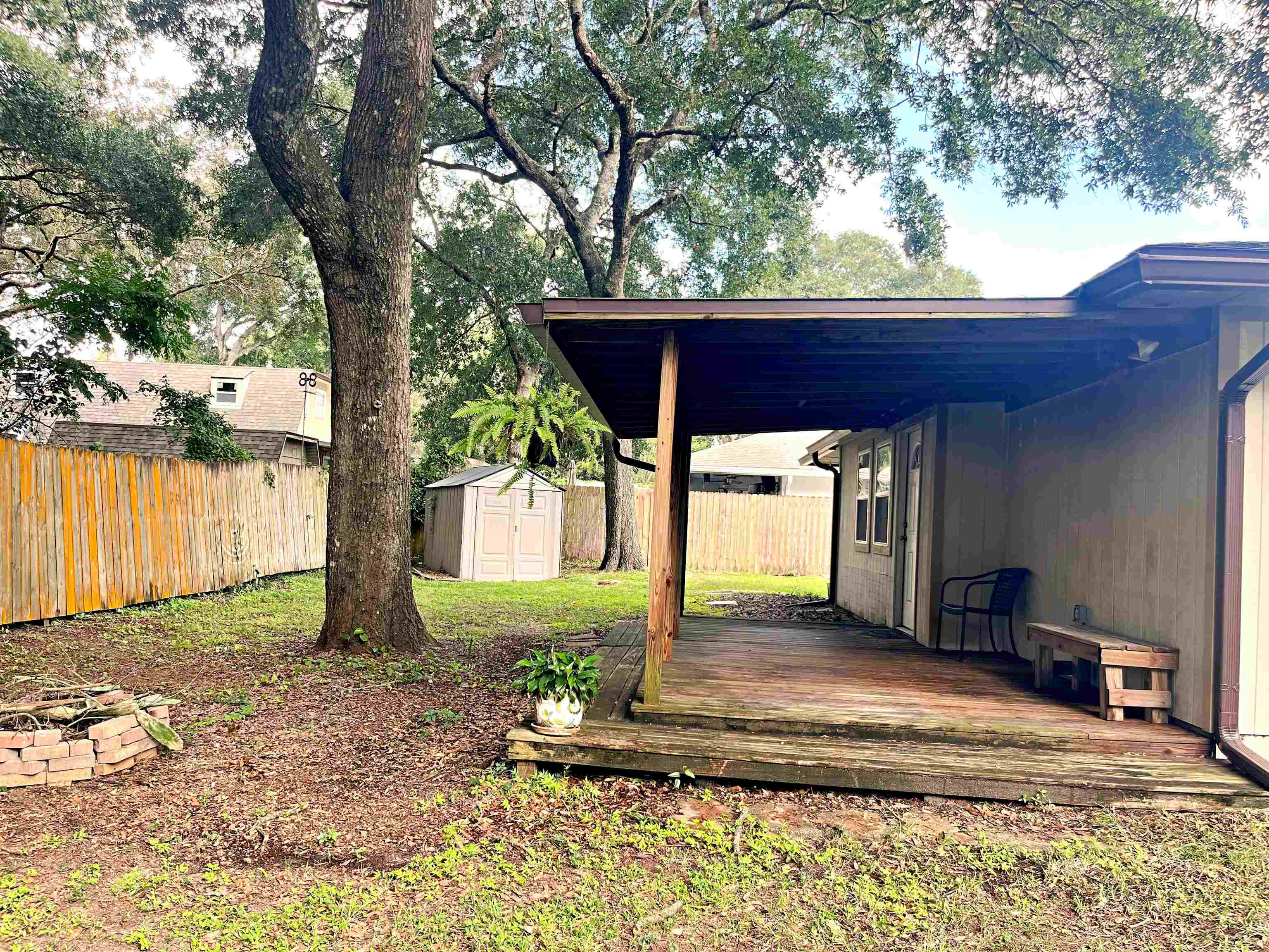 424 Orchis Road St. Augustine, FL 32086 - Photo 14 of 24 a front view of a house with garden